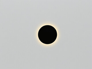 Modern Minimalist Black Circle Wall Light Fixture with Subtle Ambient Lighting