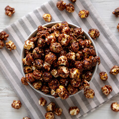 Homemade Chocolate Caramel Popcorn Ready to Eat in a Bowl, top view.