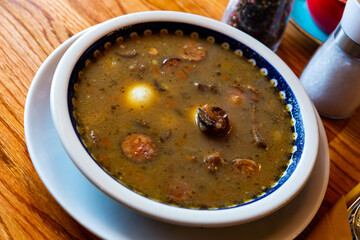 Traditional Polish rye soup with sausage and egg Zurek staropolski