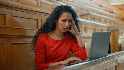 Caucasian woman student Hispanic girl Latina female in school university college typing laptop...