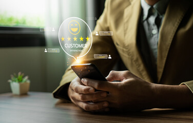 Businessman Using Smartphone to Review Customer Satisfaction Ratings with Digital Feedback Icons and Five-Star Review System for Online Service Quality and User Experience