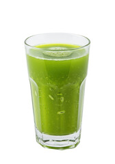 A tall glass filled with a vibrant green smoothie on a black background, showing bubbles