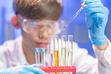 Science students analyze biochemical samples in the advanced science laboratory. Biotechnology research in the science laboratory.
