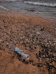beach polluted with plastic waste.environmental problems of humanity