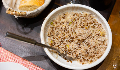 Popular hearty dish of Oriental cuisine is rice with lentils