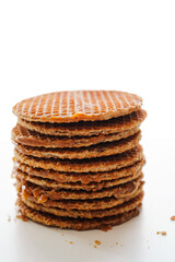 Dutch stroopwafels  (Dutch caramel waffle) stacked on white background