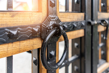 Selective focus, texture of a metal old lattice fence against the blue sky, fence lattice, lattice...