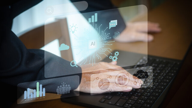 Close-up of a man's hands typing on a keyboard with a virtual interface overlay featuring AI, data analytics, and cloud computing icons. Futuristic concept of artificial intelligence.