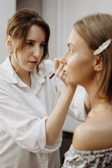 Passionate makeup artist working on creating image