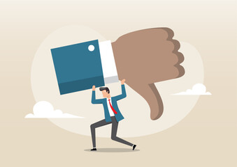 A businessman carry a heavy thumbs-down icon on his shoulders