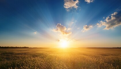 warm sun burst over calm blue sky