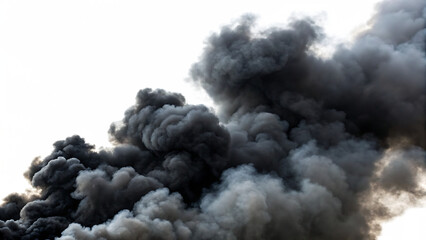 A massive, dark cloud of black smoke billows against a white background, isolated on transparent background