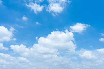 Obraz premium Stunning Blue Sky with Fluffy White Cumulus Clouds Bright Sunny Day Nature Background