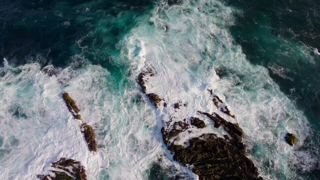 Aerial view of rocks in the ocean, Portugal.