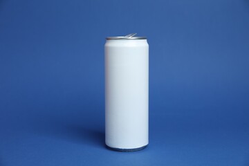 One white tin can on blue background