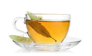 Tasty linden tea in cup, leaves and flowers isolated on white