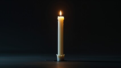 burning candle in the dark