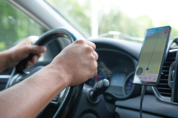 Driving with a GPS Navigation System integrated in a Car for modern travel convenience and safety