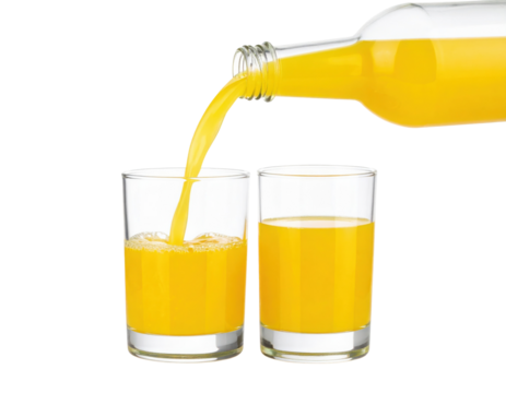 Orange juice is being poured from a clear glass bottle into a glass next to another glass filled with the juice.