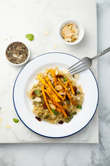Warm quinoa salad with roasted carrot