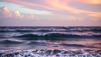 Obraz premium the image depicts a tranquil ocean scene at either dawn or dusk, given the soft light that seems to be diffused from behind the horizon