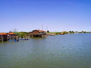 Lagoon landscape with fishermen's houses on stilts