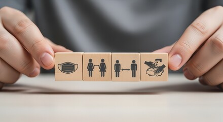 Hands Holding Wooden Blocks Showing Health and Safety Guidelines for Public Spaces
