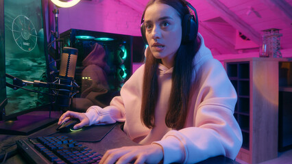 Stressed emotional upset sad Caucasian woman female girl user gamer streamer talking microphone...