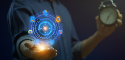 Businessman shows glowing neon line of technology circle with TIME MANAGEMENT concept icons of...