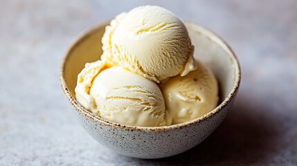 A minimalist food photography shot of cashew milk ice cream in a ceramic bowl.