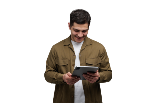 Smiling man enjoying digital content on tablet while wearing casual attire in a bright, transparent background