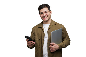 Young man smiles while holding a laptop and phone, ready for a productive day at work or school,...