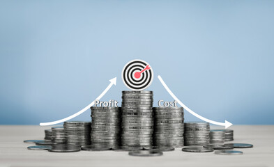 Concept of business planning, financial management for goal setting to maximize profit and minimize cost. Word profit on increased coin and word cost on decreased coin with target icon.