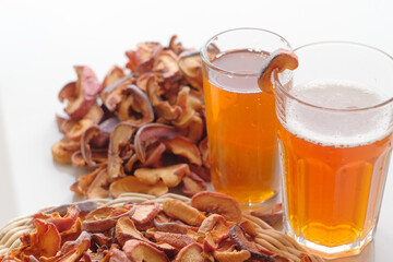 Compote dried fruits. Refreshing drink made from dried fruits. A pile of dried fruit. Lots of pieces of dry fruit. Glass of compote
