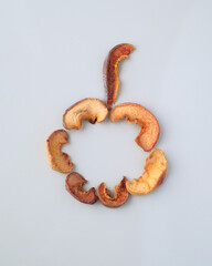 Several pieces of dry fruits on a white background. Healthy preserves dried fruits. A pile of dried fruit. Top view. Composition of pieces
