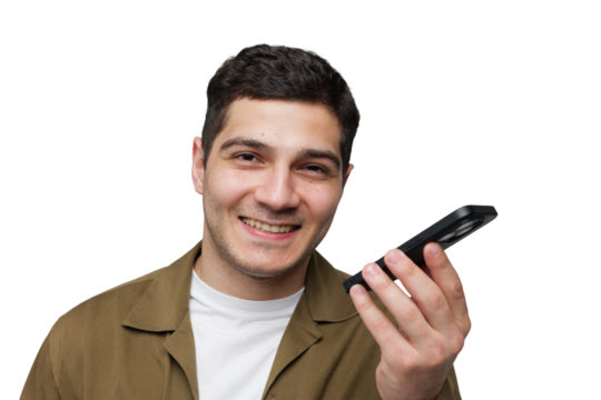 Smiling young man holding a smartphone, engaging in a conversation with enthusiasm in a bright, transparent background