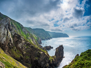 Cabo Ortegal Galicia Spain steep cliffs rising above Atlantic deep green slopes sharp rocks...