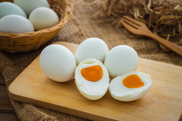 Salted duck eggs on wooden board