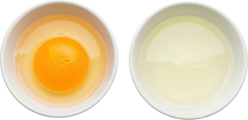 Overhead view of a cracked whole egg with yolk and egg white in one white bowl next to a bowl of separated egg whites