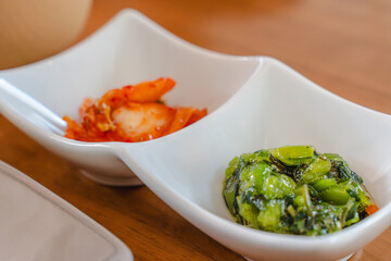Kimchi and Japanese-style Pickled Greens in Small Side Dishes / キムチと青菜のおひたしの小鉢
