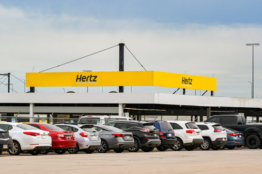 Denver, Colorado, USA - 4 June 2025: Sign above the rental car depot for Hertz at Denver International Airport.