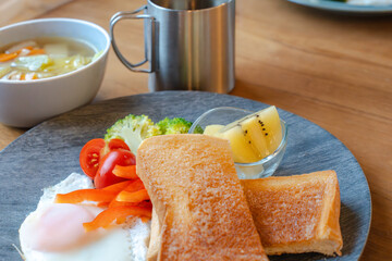 Healthy Breakfast with Toast, Sunny Side Up Egg and Fruit / トーストと目玉焼きとフルーツの健康的な朝食
