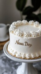 National Nana Day Elegant white cake with nana day text and whipped cream decorations