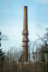 Old chimney from red bricks in Ostrava Svinov district, vertical