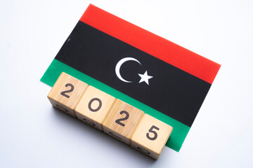 2025, Libya Flag with date block, Concept, Important events for Libya the new year, election,...