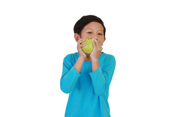 Asian boy biting a fresh guava and looking camera isolated on white studio background.