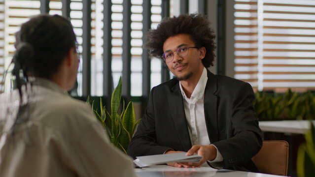 African American business leader businessman insurance agent bank reading resume intern sad client man dissatisfied refuse no failed job interview two businessmen office bad work report cooperation