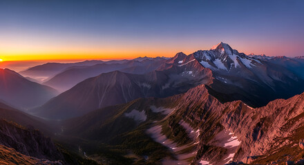 Naklejka premium A breathtaking panoramic view of the mountains under the beautiful golden sunset.