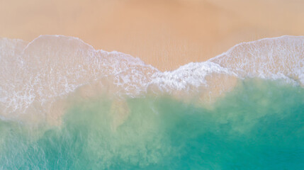 Fototapeta premium Aerial view of ocean waves crashing on sandy beach, tropical summer seascape perfect