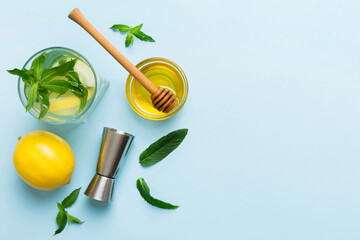 Caipirinha, Mojito cocktail, vodka or soda drink with lime, mint and straw on table background....